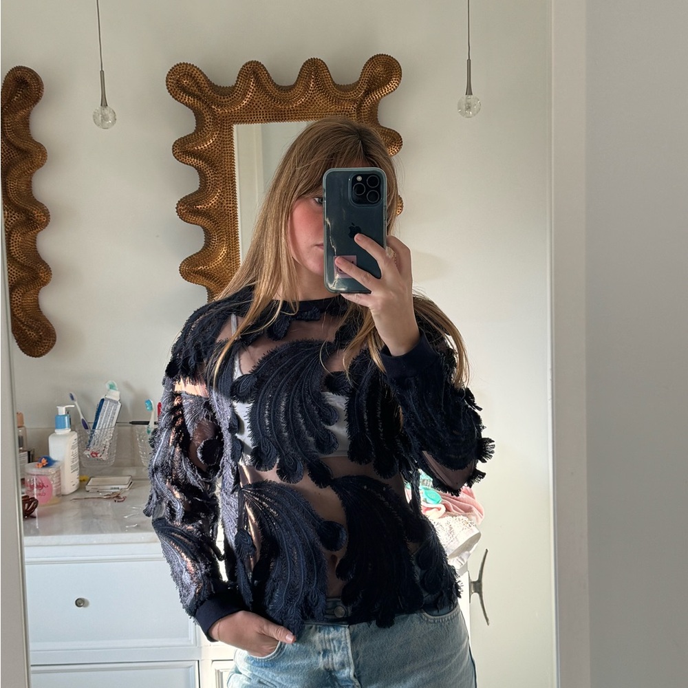 Sheer appliqué top